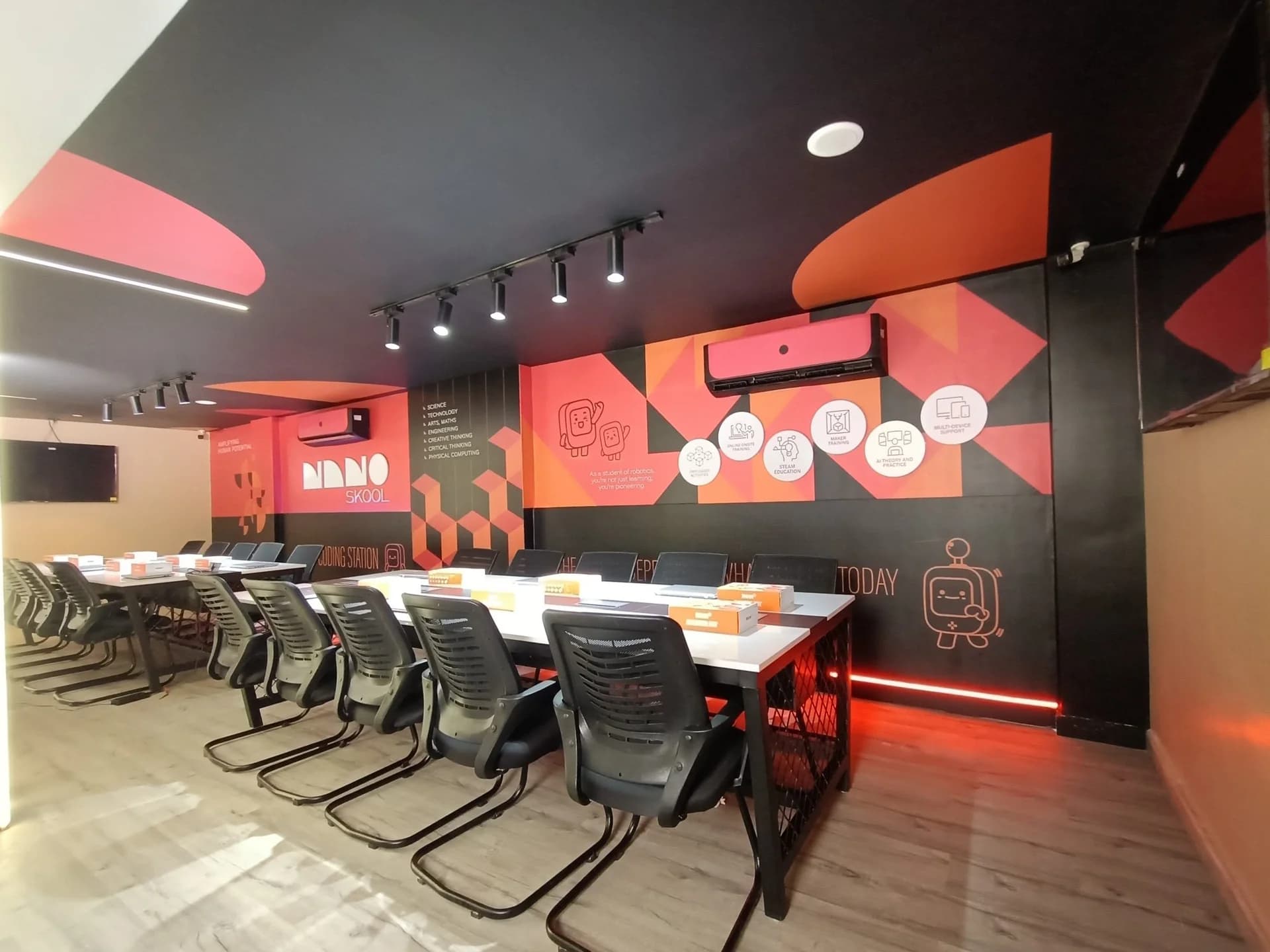 NanoSkool learning lab with workstations and modular robotics kits